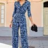Blue Animal Print Ruffle Detail Wrap Jumpsuit 1 Blue Animal Print Ruffle Detail Wrap Jumpsuit -Sosandar Fashion Store web 08 s23jj013blan01 022 rt