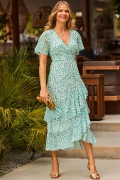 Green Abstract Print Layered Hem Angel Sleeve Maxi Dress 14 Green Abstract Print Layered Hem Angel Sleeve Maxi Dress -Sosandar Fashion Store web 2305 17 s23dw178grcv01 17 001 rt