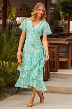 Green Abstract Print Layered Hem Angel Sleeve Maxi Dress 11 Green Abstract Print Layered Hem Angel Sleeve Maxi Dress -Sosandar Fashion Store web 2305 17 s23dw178grcv01 17 193