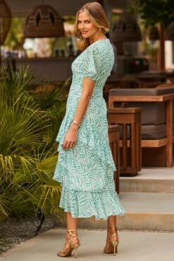 Green Abstract Print Layered Hem Angel Sleeve Maxi Dress 12 Green Abstract Print Layered Hem Angel Sleeve Maxi Dress -Sosandar Fashion Store web 2305 17 s23dw178grcv01 17 255 rt