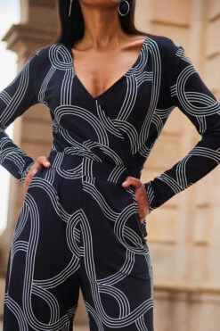 Black Geometric Print Faux Wrap Front Jumpsuit -Sosandar Fashion Store web 2307 84 a20jj004bkge01 84 156