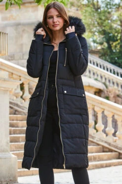 Black Longline Padded Coat With Faux Fur Hood 13 Black Longline Padded Coat With Faux Fur Hood -Sosandar Fashion Store web 2309 141 a23ow021bk0001 141 177