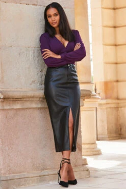 Black Faux Leather Long Line Pencil Skirt With Split 9 Black Faux Leather Long Line Pencil Skirt With Split -Sosandar Fashion Store web 2309 155 a23tj069pe0015 a23sp004bk0001 155 197 1