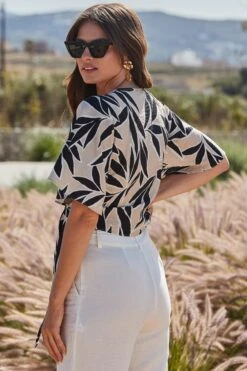 Ivory Floral Print Tie Side Wrap Top 12 Ivory Floral Print Tie Side Wrap Top -Sosandar Fashion Store web 2405 85 s24tw043ivfl01 85 178