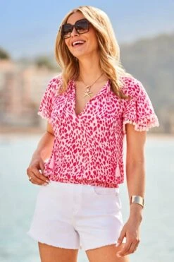 Pink & White Animal Print Pom Pom Top