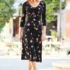 Black Floral Print Ruched Neck Midi Jersey Dress 1 Black Floral Print Ruched Neck Midi Jersey Dress -Sosandar Fashion Store web 64 s22dj044bkfl 027 1