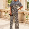 Black & White Mono Print Satin Angel Sleeve Wide Leg Jumpsuit 1 Black & White Mono Print Satin Angel Sleeve Wide Leg Jumpsuit -Sosandar Fashion Store web crop 2307 83 s23jw038bkcv01 83 048
