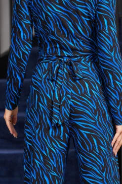 Blue Animal Print Wrap Front Wide Leg Jumpsuit With Pockets -Sosandar Fashion Store web rt 107 a20jj004blan01 108